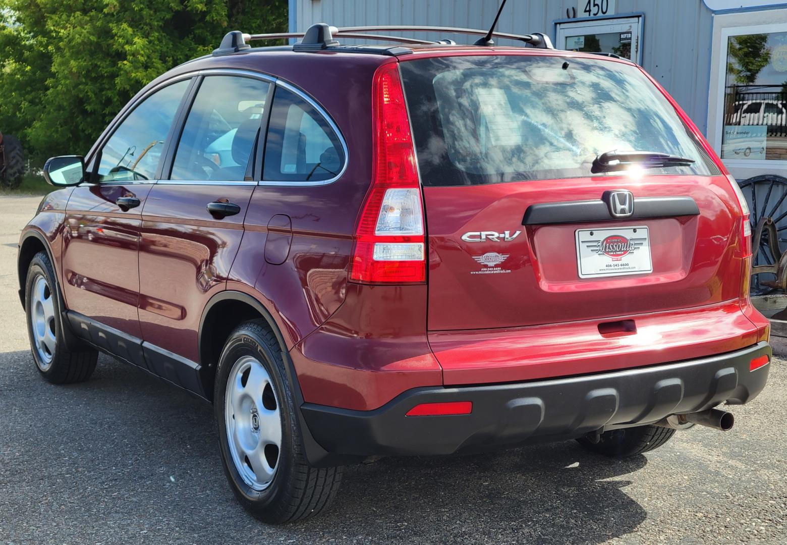 2009 Red /Gray Honda CR-V LX (5J6RE483X9L) with an 2.4L L4 engine, 5 Speed Automatic transmission, located at 450 N Russell, Missoula, MT, 59801, (406) 543-6600, 46.874496, -114.017433 - Great Running AWD SUV. 2.4L I4 Engine. 5 Speed Automatic Transmission. Air. Cruise. Tilt. Power Windows and Locks. New Tires. Roof Rack. Does have a Rebuilt Title so financing is not available. - Photo#7